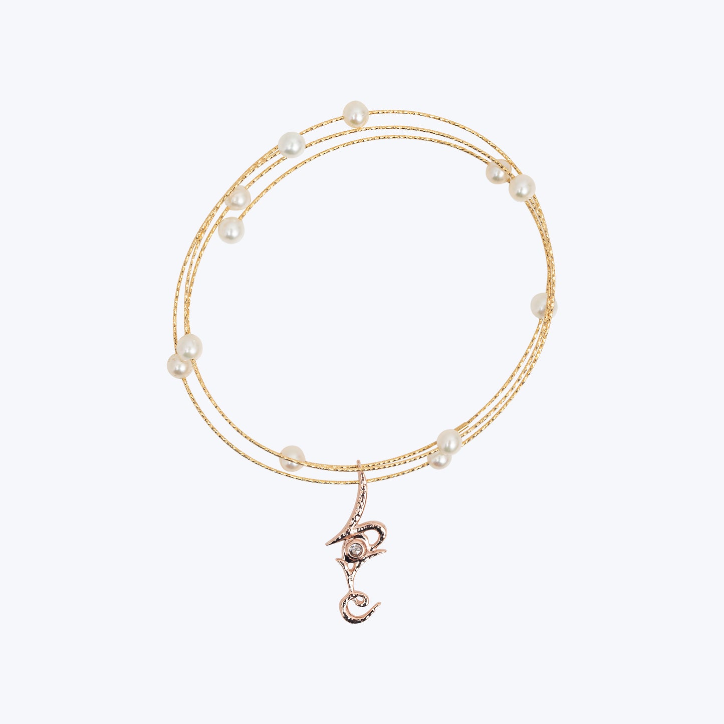 18K Yellow Gold Wire Bracelet Pearls and a Love Pendant with Diamond